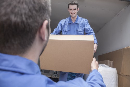 Packed office boxes and workstation items ready for transport