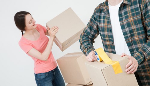 Furniture and boxes prepared for a home move in Harold Park