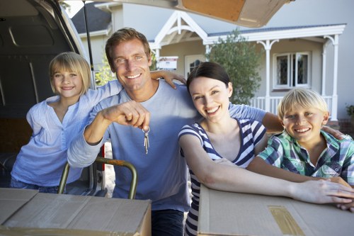 Packing and loading household items into a moving van